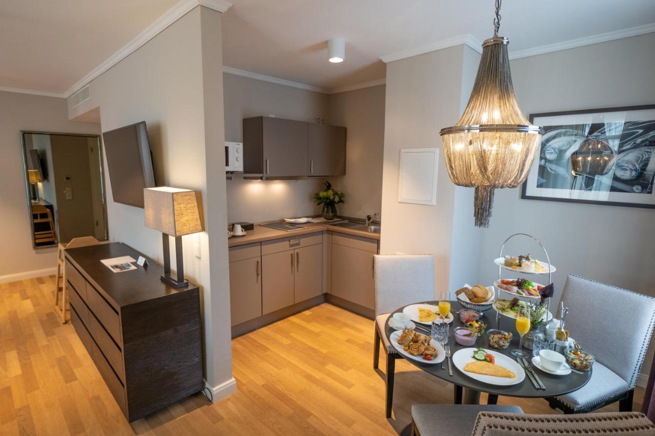 Vila Vita Rosenpark Marburg Экстерьер фото A kitchen in a serviced apartment