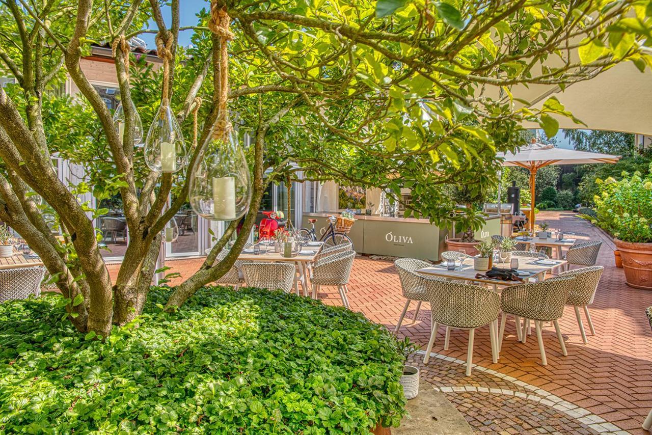 Vila Vita Rosenpark Marburg Экстерьер фото The garden of the restaurant
